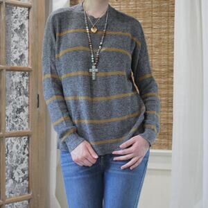 Grey and yellowbrown striped sweater